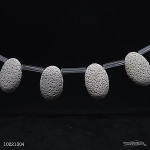 1273 32x21 White Lava Beads